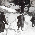 Soldiers marching thru the mountains in Carpathia.They are not wearing winter clothing and are in freezing conditions.Even -20 to -30 centigrade temps